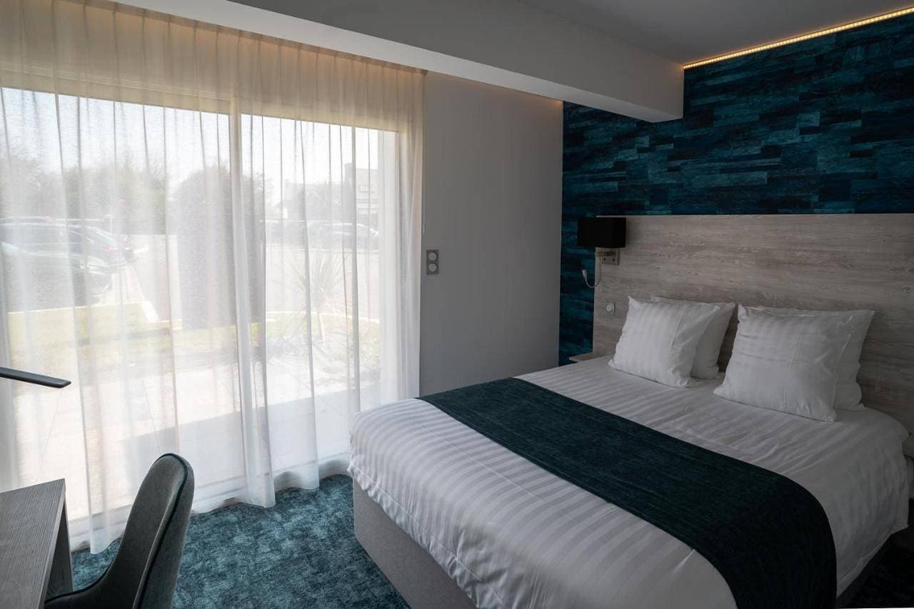 Foto 4 von 9: Comfort Room with Garden View