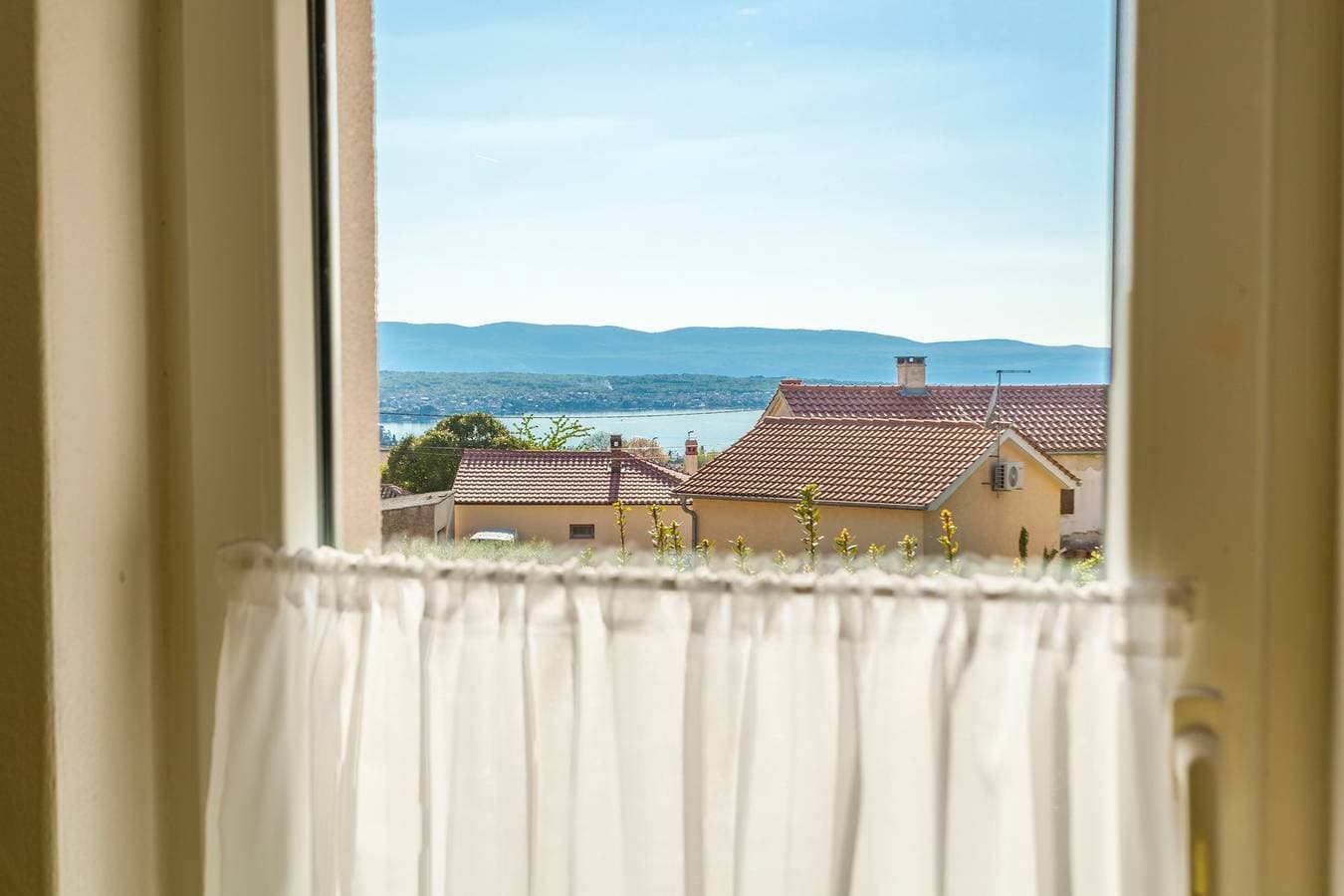 Foto 9 von 32: Apartment für 4 Personen mit privatem Parkplatz und Meerblick