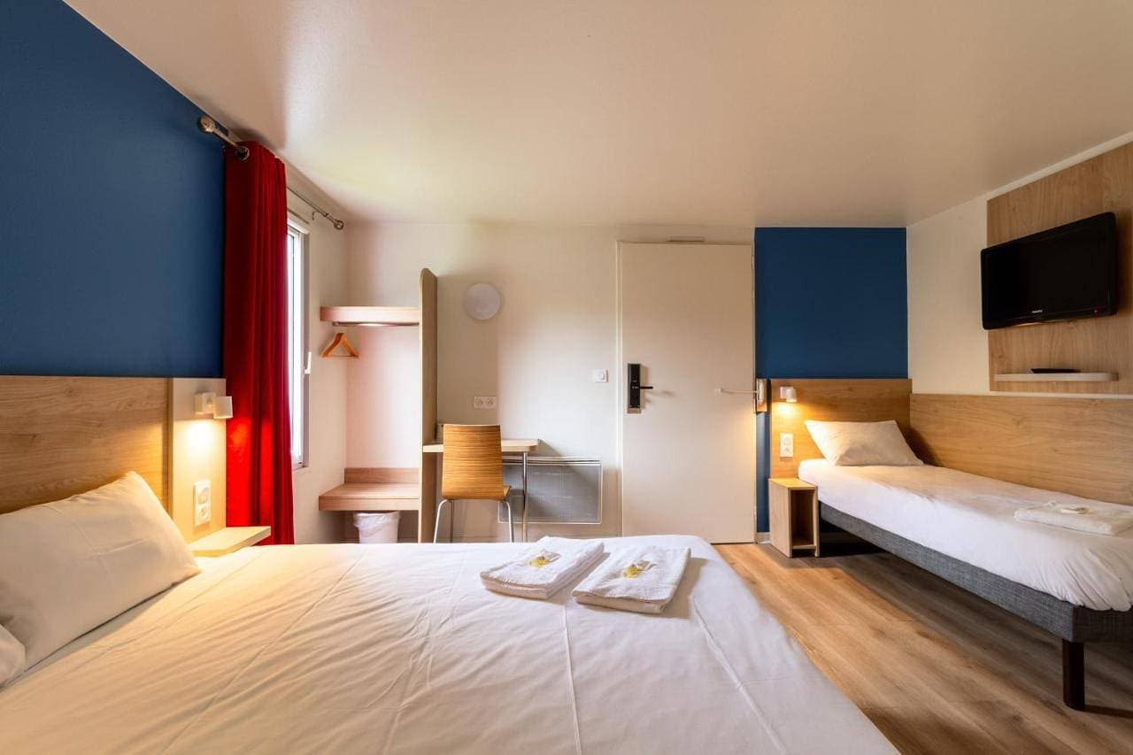 Foto 6 von 12: Triple Room