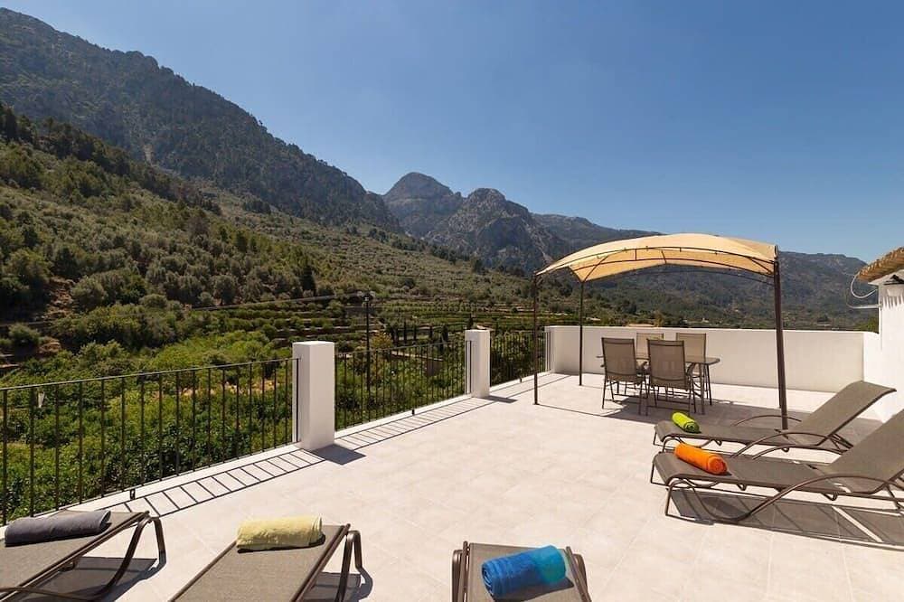 Foto 13 von 17: Town House Alba | Terrasse & Tramuntana-Blick