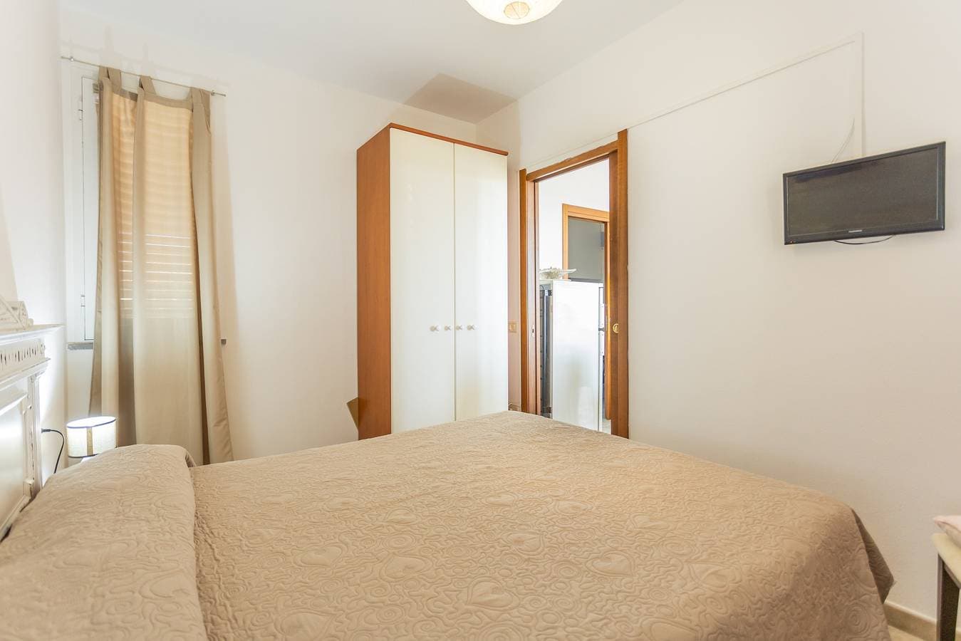 Foto 4 von 24: Ferienhaus 'Am Hafen – nur Schritte vom Meer' mit Meerblick, privater Terrasse & Klimaanlage
