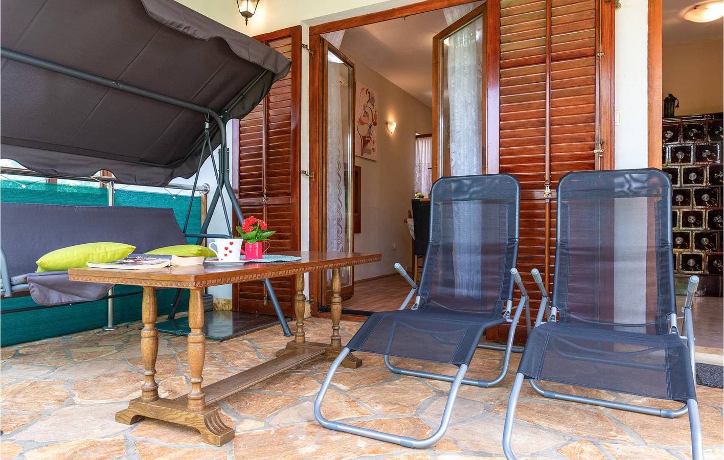 Foto 8 von 29: Gemütliche Ferienwohnung, 2 km von der Küste entfernt: WLAN, Klimaanlage, Parkplatz und Terrasse