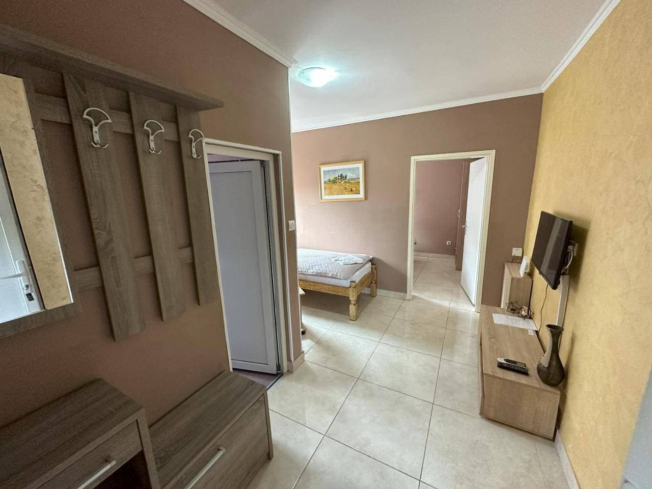 Foto 10 von 11: Triple Room with Private Bathroom