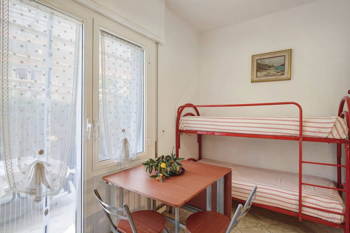 Foto 6 von 22: Apartment 'Casa Dei Garofani – Kostenfreier Parkplatz' mit privatem Garten