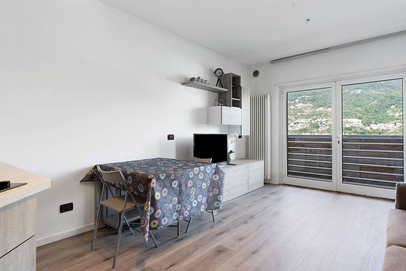 Foto 3 von 27: Apartment 'Valsugana D’incanto' mit Seeblick, privater Terrasse und Gemeinschaftsgarten