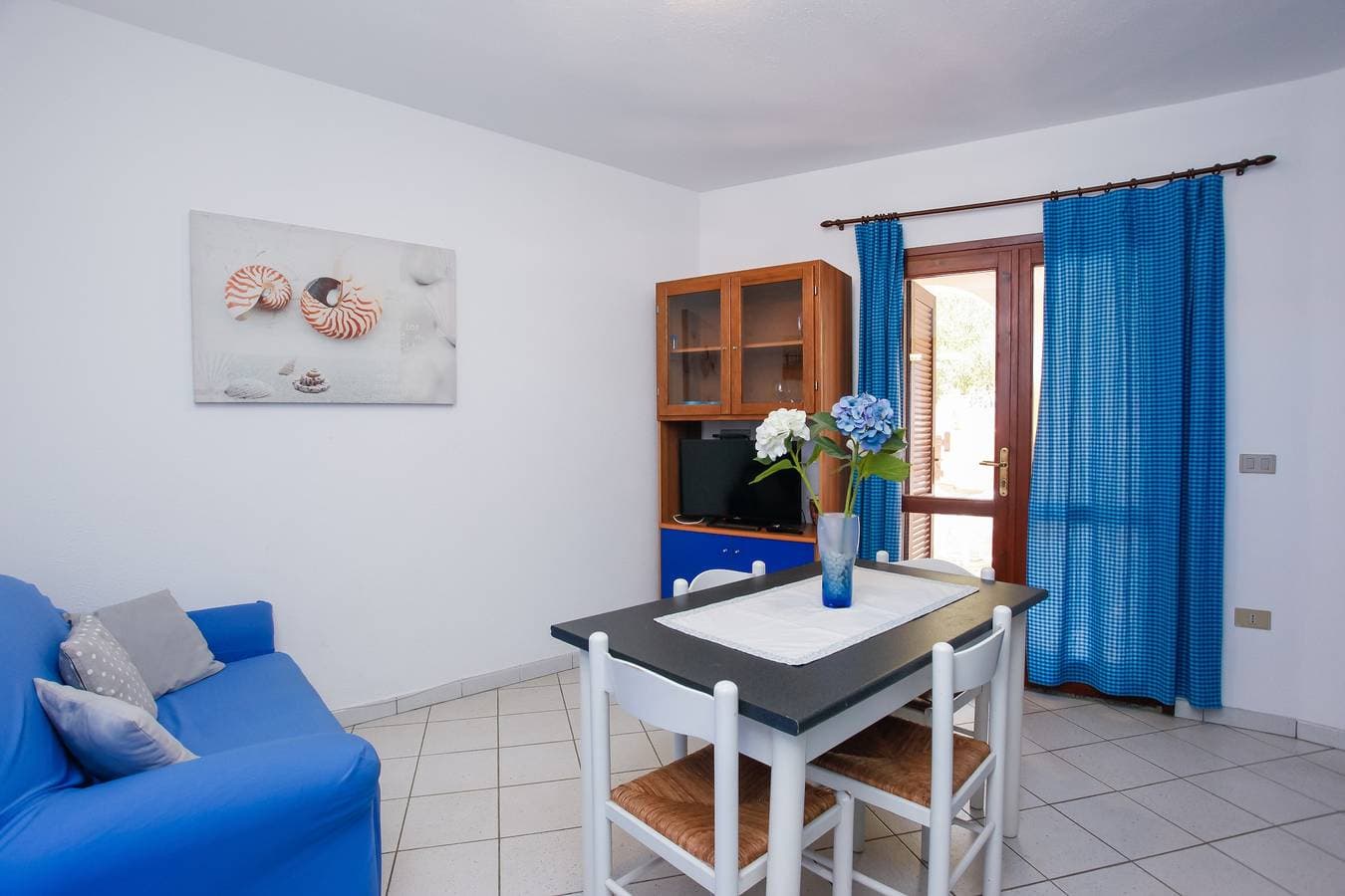 Foto 4 von 17: Ferienhaus „Mirtagru Appartamento Dell'Oleandro“ mit Garten, 2 privaten Terrassen & WLAN