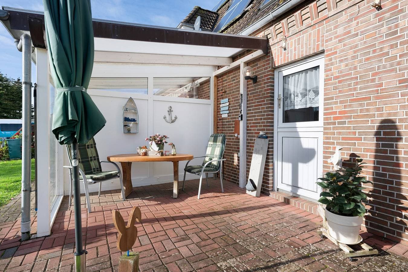 Foto 4 von 27: Ferienwohnung 'Haus Sünnschien' mit Gemeinschaftsterrasse, Gemeinschaftsgarten und WLAN