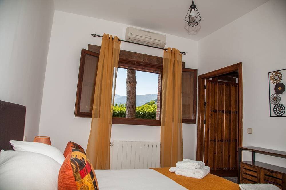 Foto 5 von 30: Cabana-Deluxe-Ensuite mit Dusche-Bergblick-Rabilargo