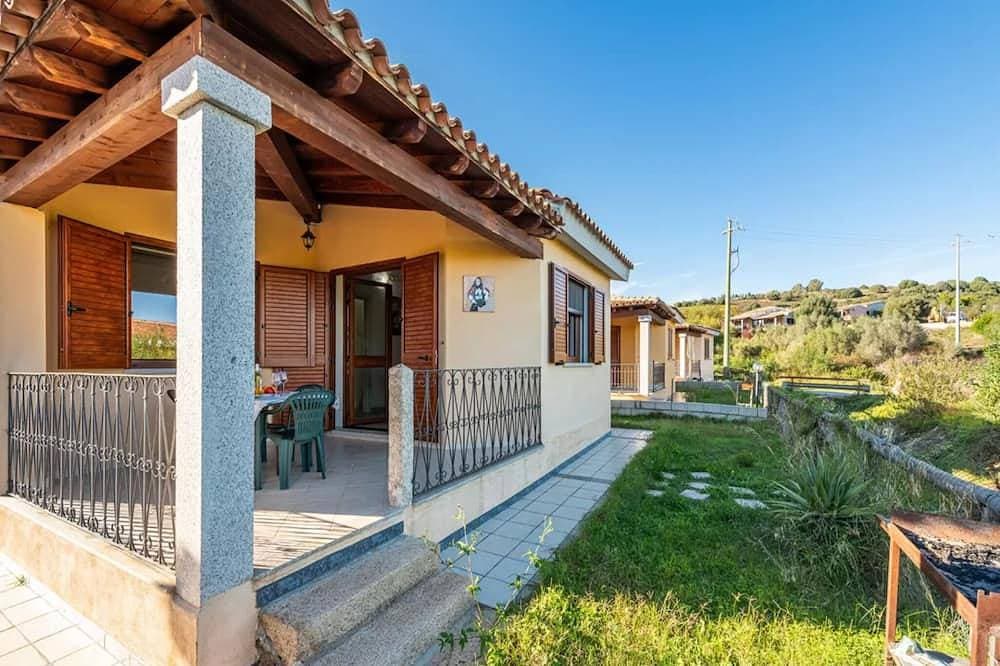 Charmante freistehende Villa in Capo Comino 1