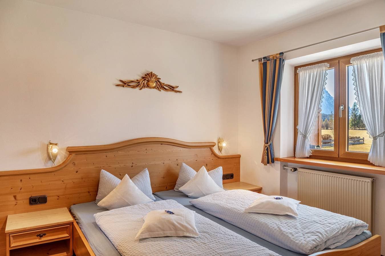 Foto 8 von 18: Ferienwohnung 'Alpenblick Tilly - Eibsee' mit Bergblick, Gemeinschaftsterrasse und WLAN
