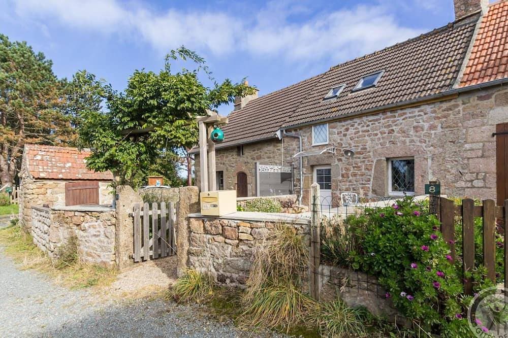 Foto 10 von 21: Gemütliche Küstenhäuschen mit Terrasse, Garten und Meerblick, ideal für Erholung und Entspannung