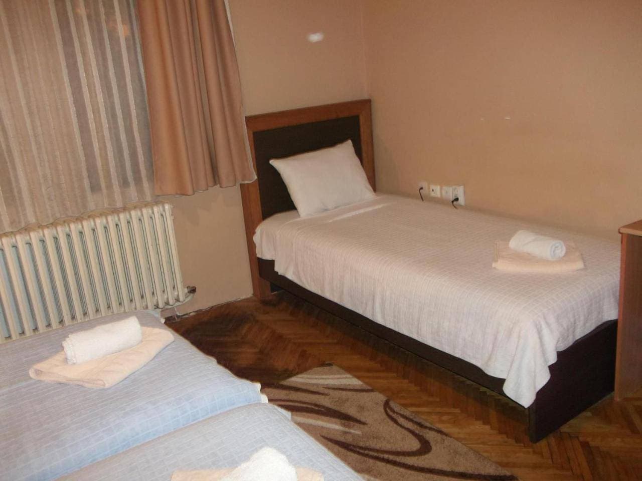Foto 10 von 16: Triple Room