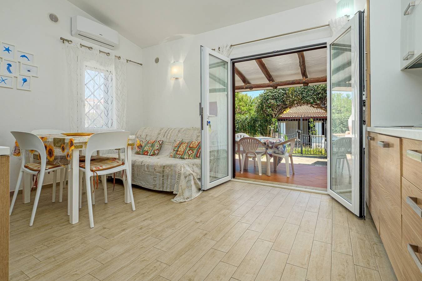 Foto 3 von 20: Ferienhaus 'Confortevole Caposchiera' mit privater Terrasse, WLAN und Klimaanlage