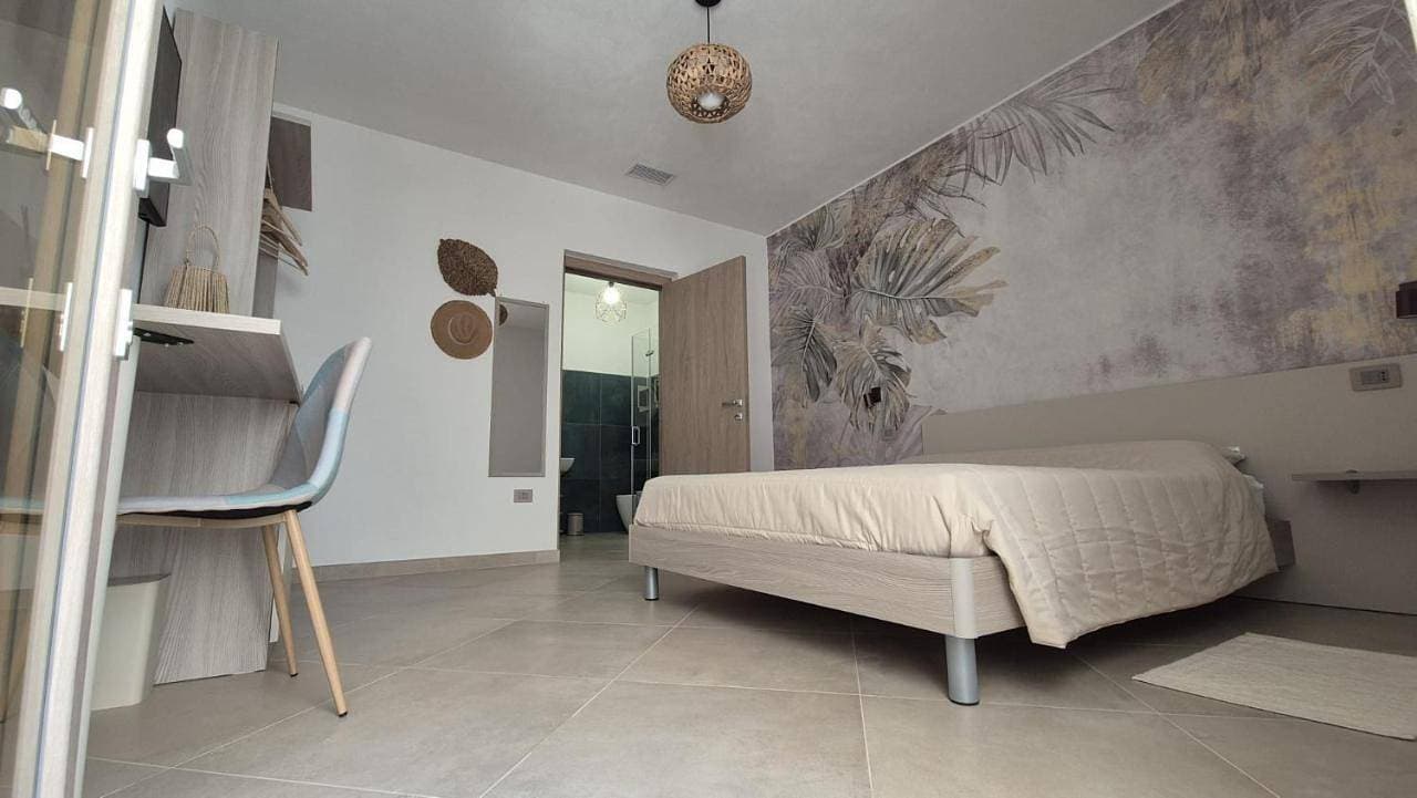 Foto 7 von 12: Double Room with Private Bathroom