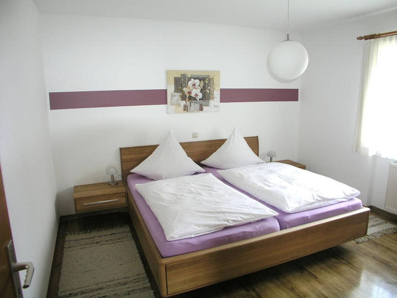 Foto 7 von 26: Ferienwohnung 1 mit privater Terrasse, Gemeinschaftsgarten und Wi-Fi