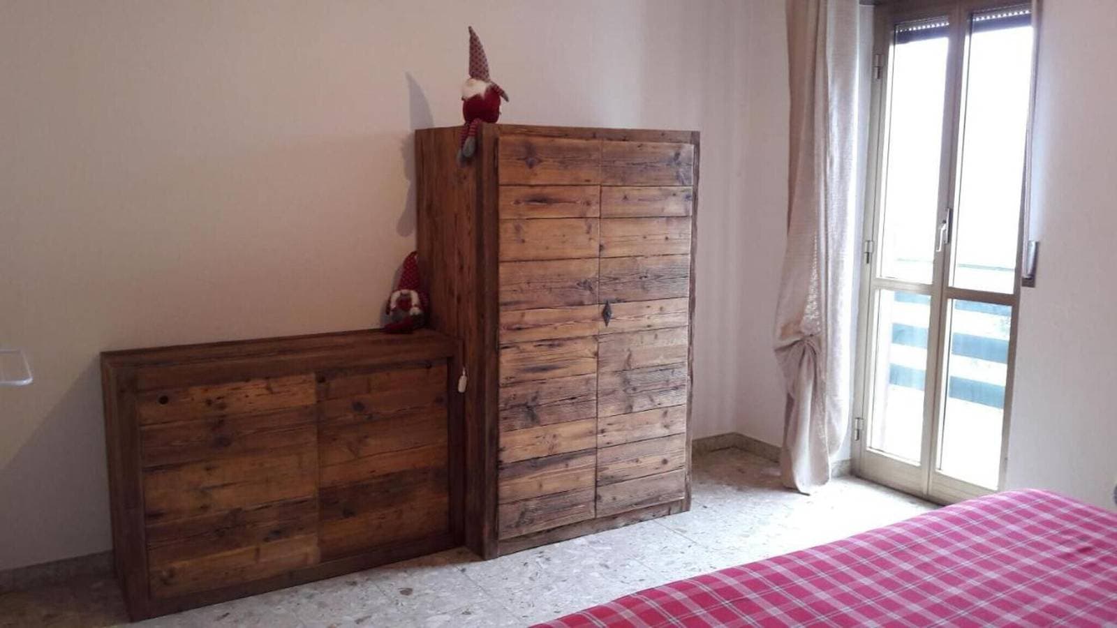 Foto 9 von 24: Ferienwohnung 'Mansarda Le Chateau' mit Bergblick, Gemeinschaftsgarten und Wi-Fi