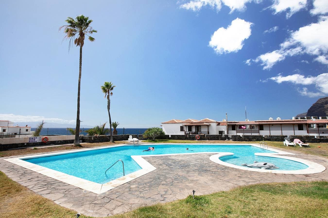 Foto 2 von 31: Helles Apartment auf Teneriffa nahe Strand: Pool, private Terrasse & WLAN