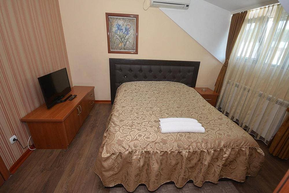 Foto 6 von 12: Double Room with Shower