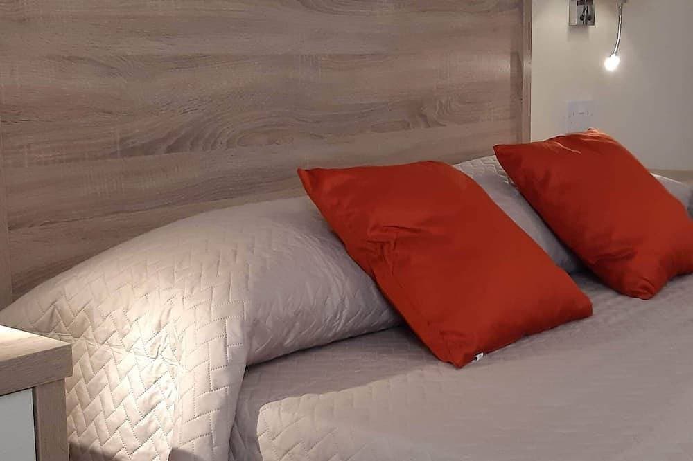 Foto 3 von 22: Komfortables 1-Schlafzimmer-Apartment für 2/3 Personen mit Klimaanlage, Schwimmbad & WLAN