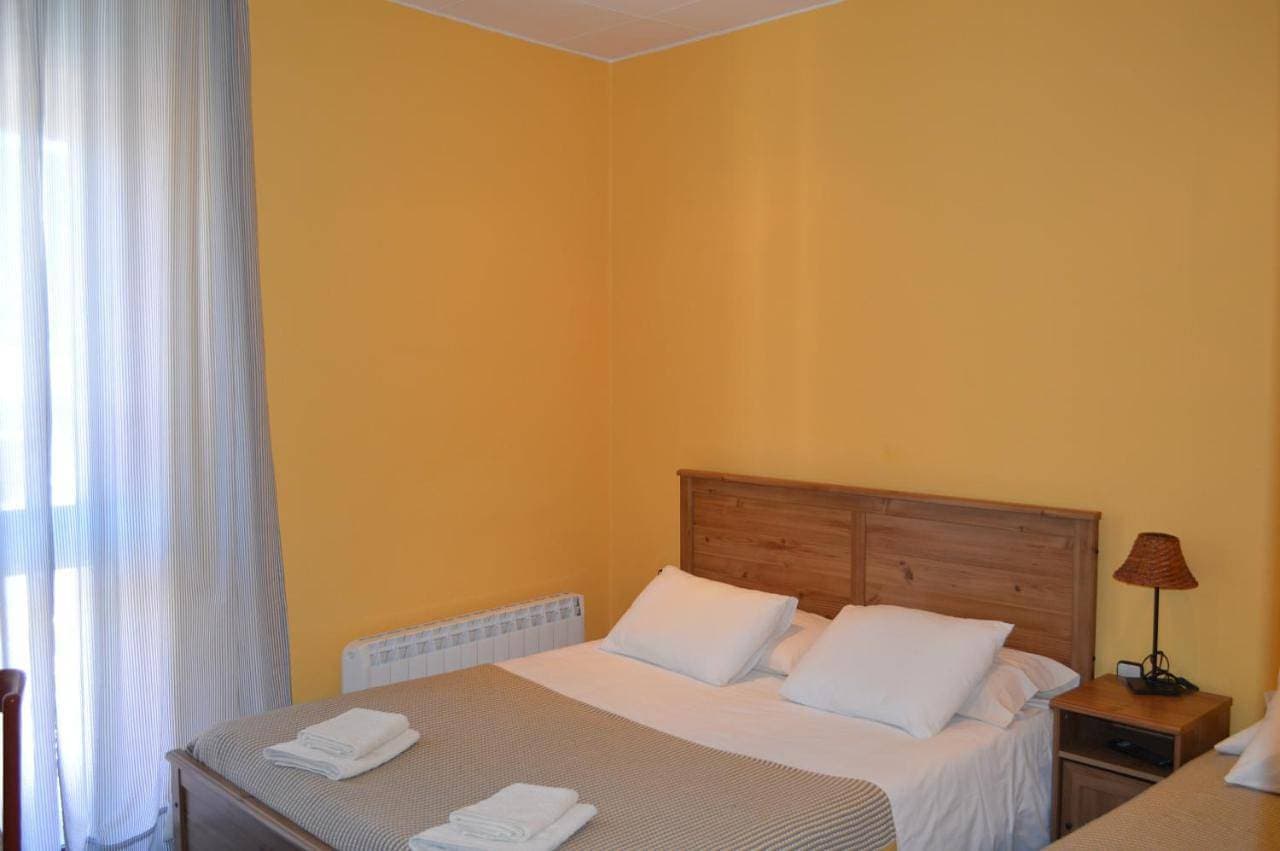 Foto 2 von 5: Triple Room