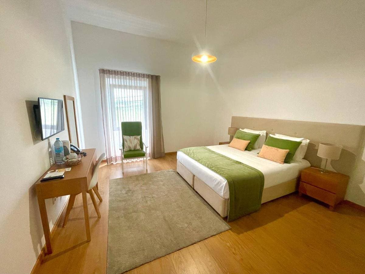 Foto 5 von 12: Double Room with Shared Bathroom