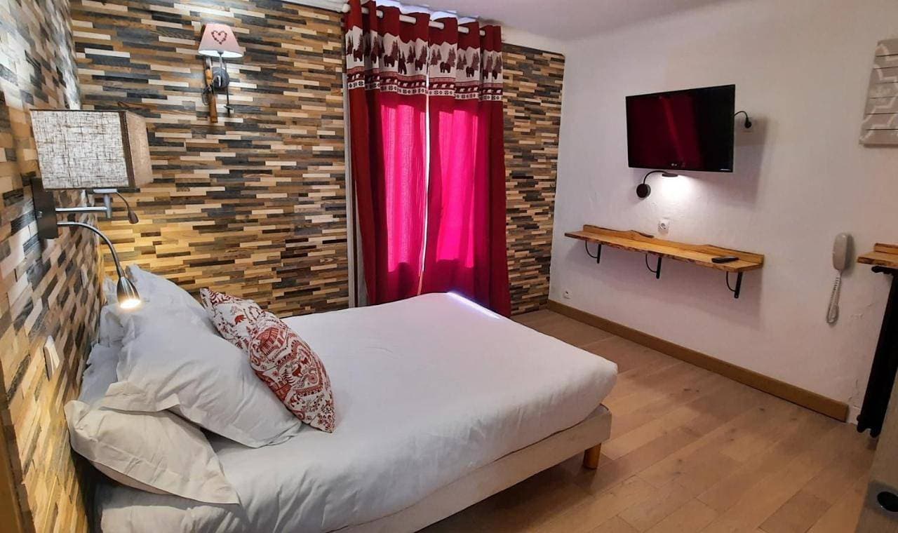 Foto 5 von 7: Double Room with Balcony and Slope View