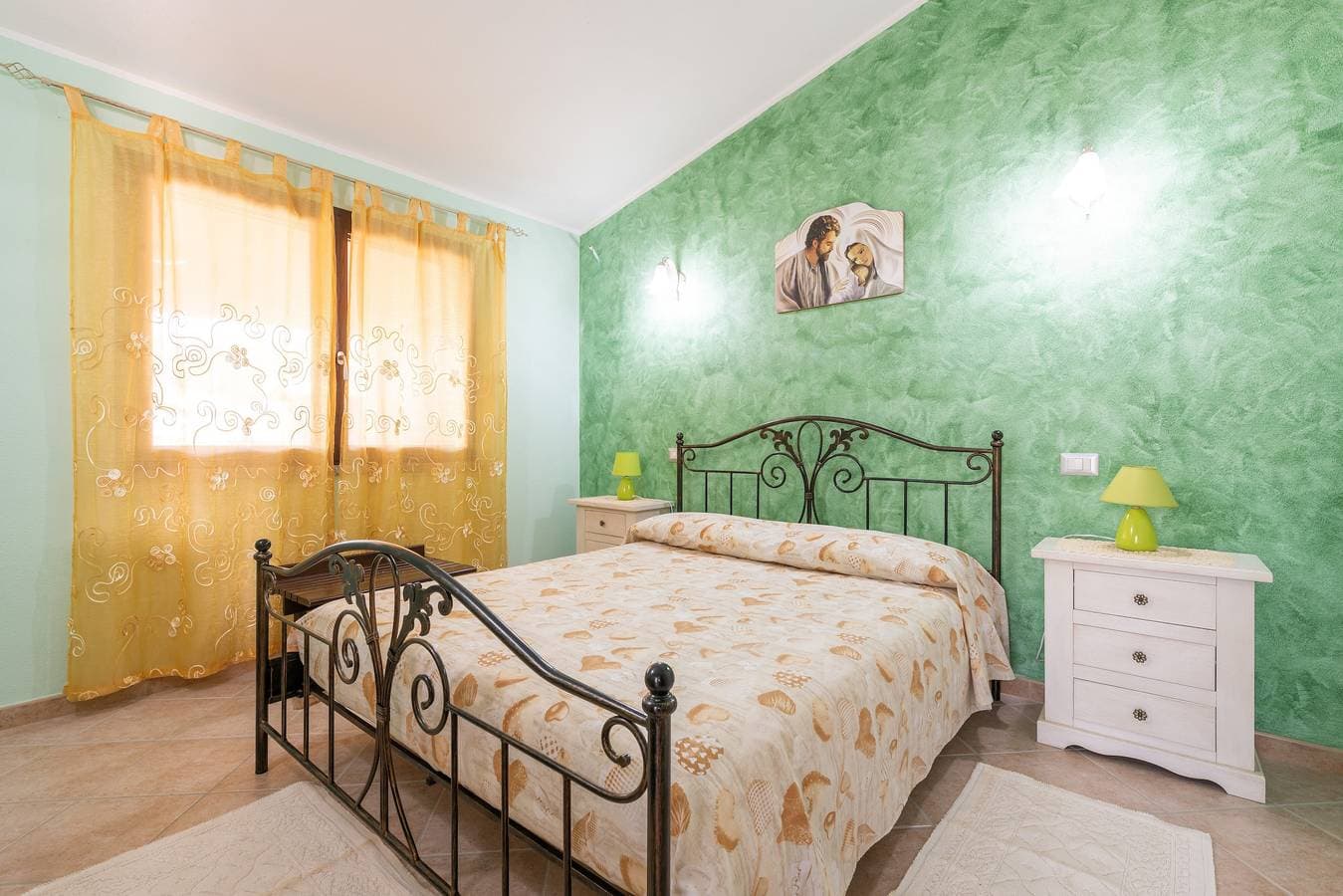 Foto 8 von 28: Ferienhaus 'Villetta Delfino ' mit Bergblick, privater Terrasse und eigenem Garten