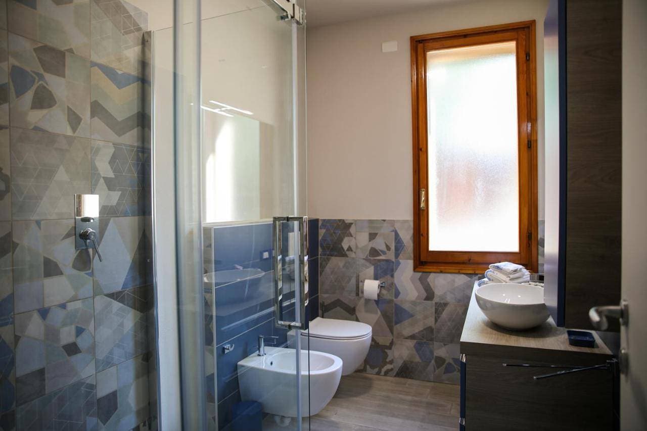 Foto 7 von 8: Quadruple Room with Private External Bathroom