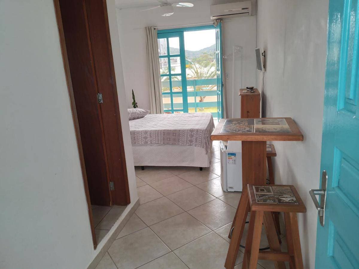 Foto 2 von 11: Quadruple Room with Garden View