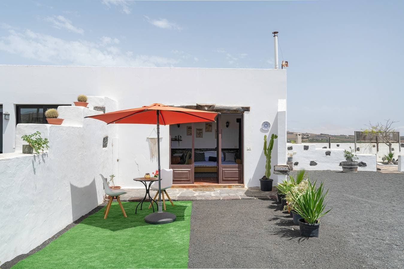 Foto 4 von 24: Ferienhaus 'Volcanic House – im Herzen von' mit Gemeinschaftsgarten und WLAN
