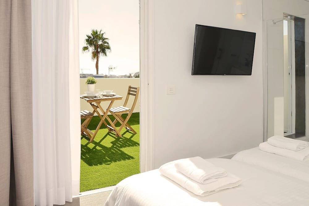 Foto 3 von 7: Great studio penthouse of 25 m2, with a large and terrace overlooking the sea and all of Santa Cruz