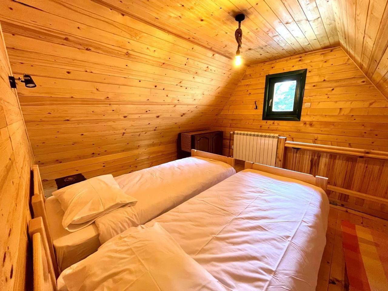 Foto 10 von 10: Quadruple Room