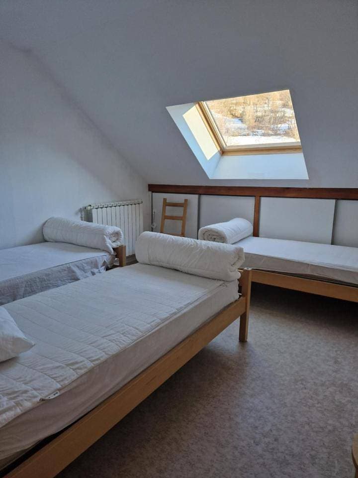 Foto 8 von 12: Triple Room with Shared Bathroom