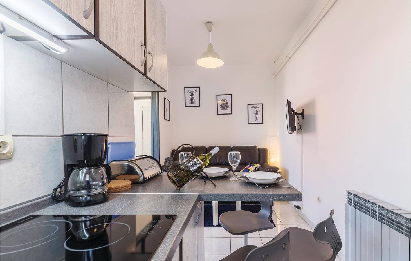 Foto 11 von 22: Gemütliche Ferienwohnung mit Terrasse, WLAN und Parkplatz in der Nähe des Caffè Bar Porto