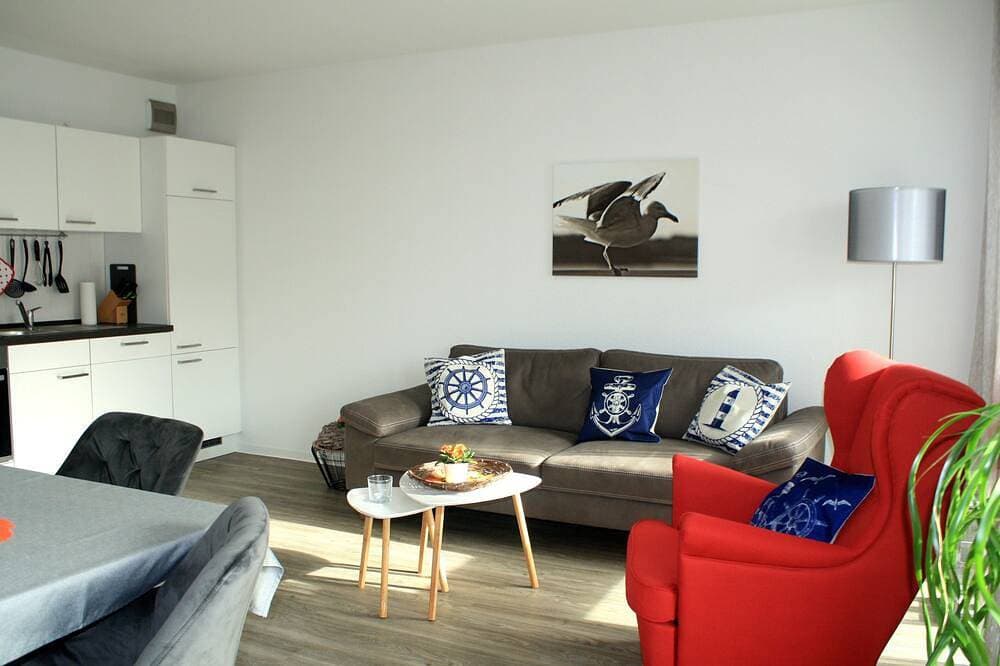 Neue Ferienwohnung mit sonnigen Balkon und großem Fahrradkeller 1