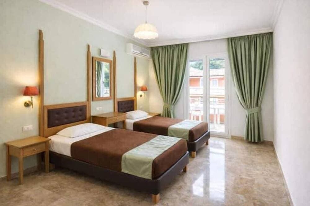 Foto 3 von 4: Cozy Coastal Hideaway at Irene Apartments – Steps from Agios Gordios Beach