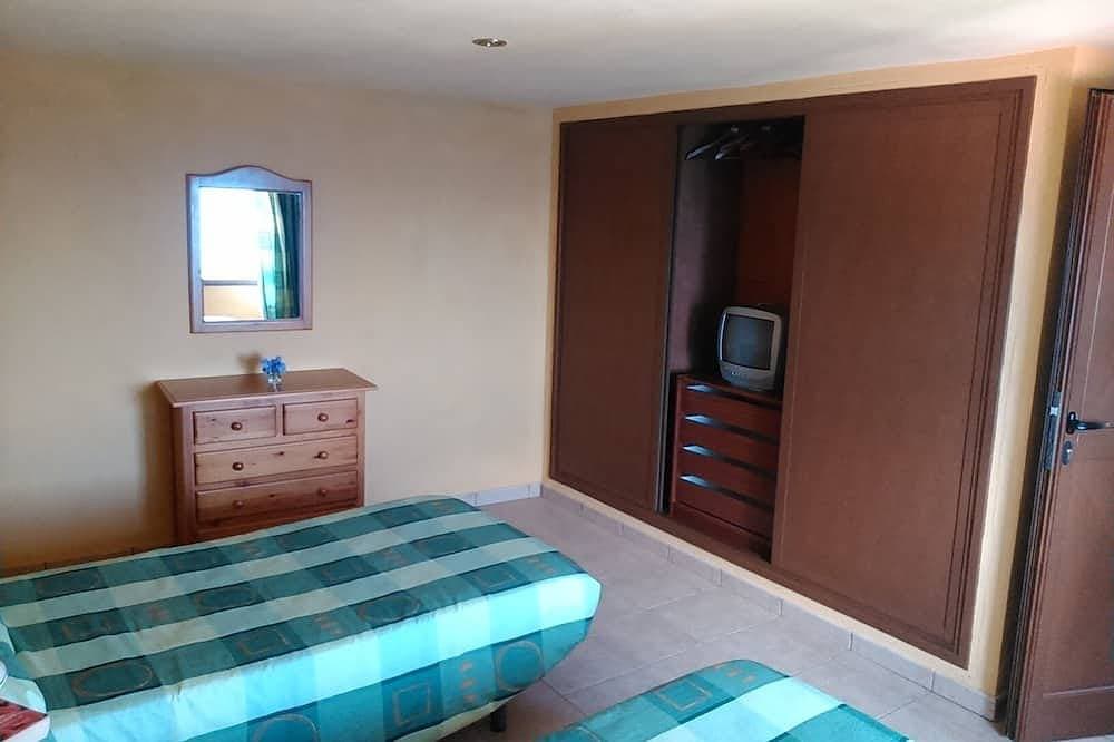 Foto 2 von 14: Ruhig gelegenes Appartment mit grosser Fensterfront, Blick nach Teneriffa