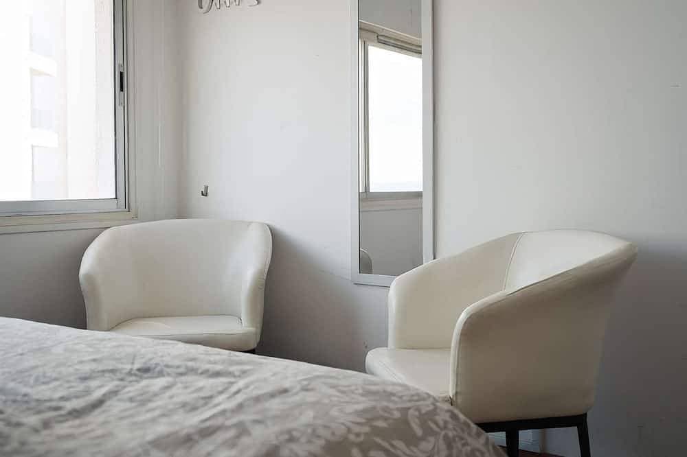 Foto 3 von 19: Cozy Sea View Apt w/ pool access + Netflix