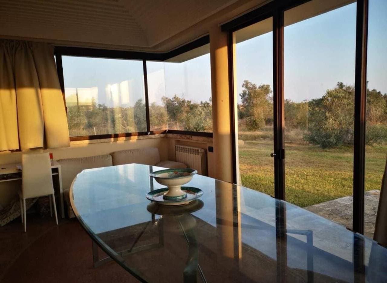 Foto 2 von 10: Villa 'Residenze Uliveto - 16' mit Gemeinschaftspool, privater Terrasse und Klimaanlage