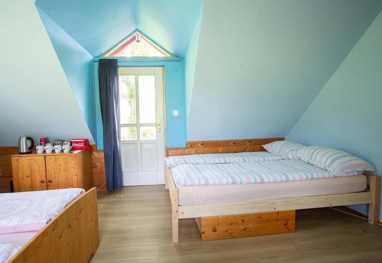 Foto 9 von 15: Quadruple Room