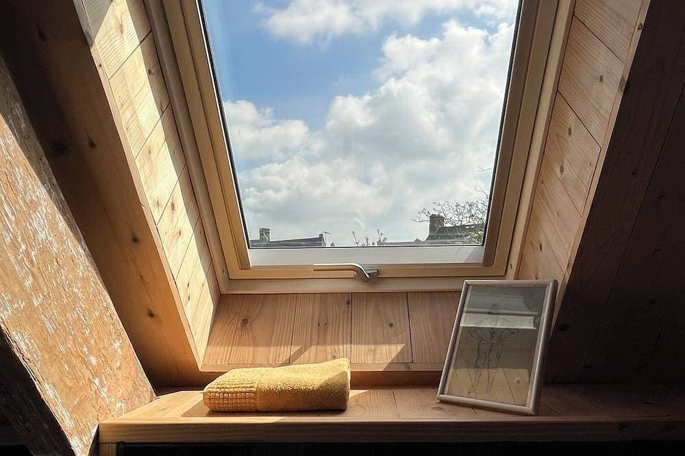 Foto 10 von 10: Small Stone & Wood House