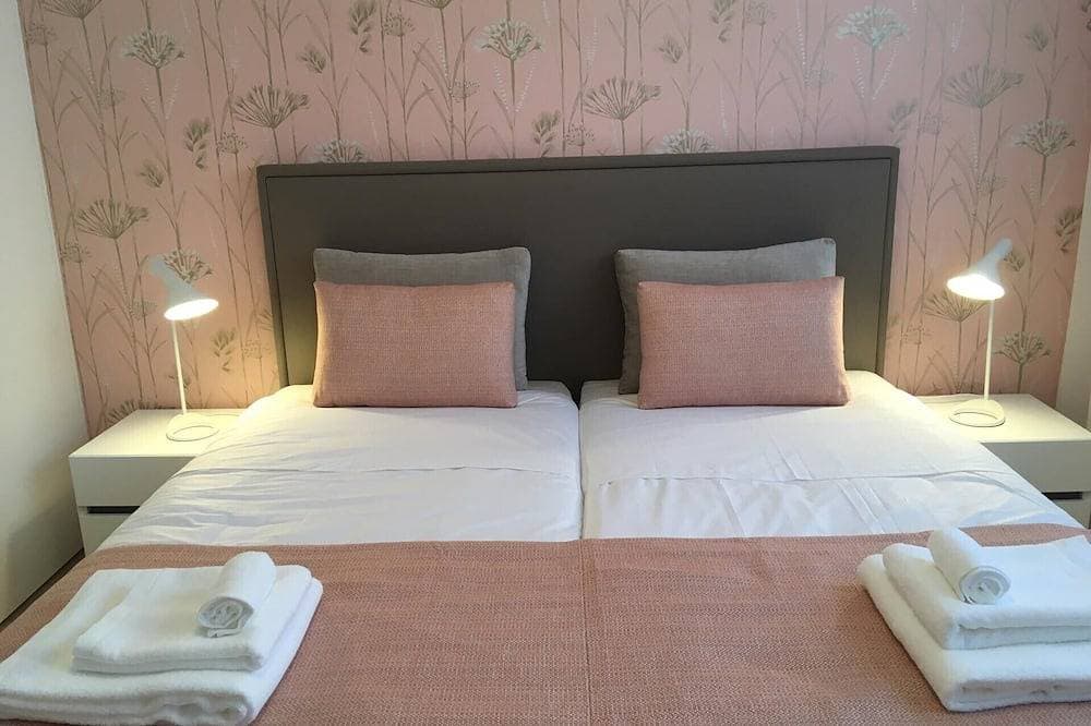Foto 3 von 30: Genießen Sie modernen Komfort und privaten beheizten Pool im Casa Ambiente Verde