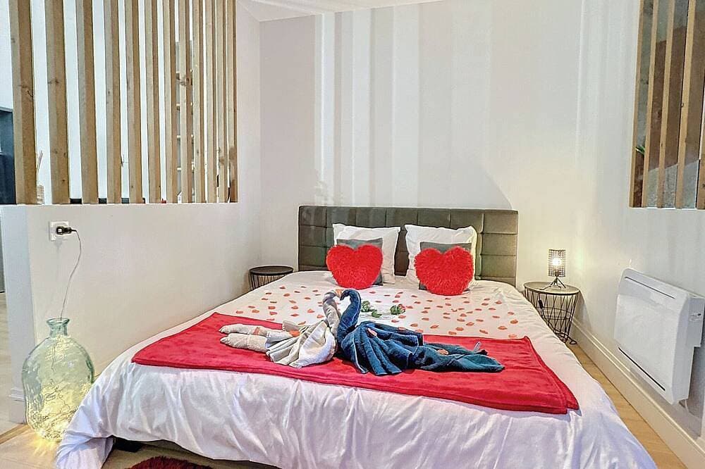 Foto 2 von 12: Romantic loft with private Jacuzzi