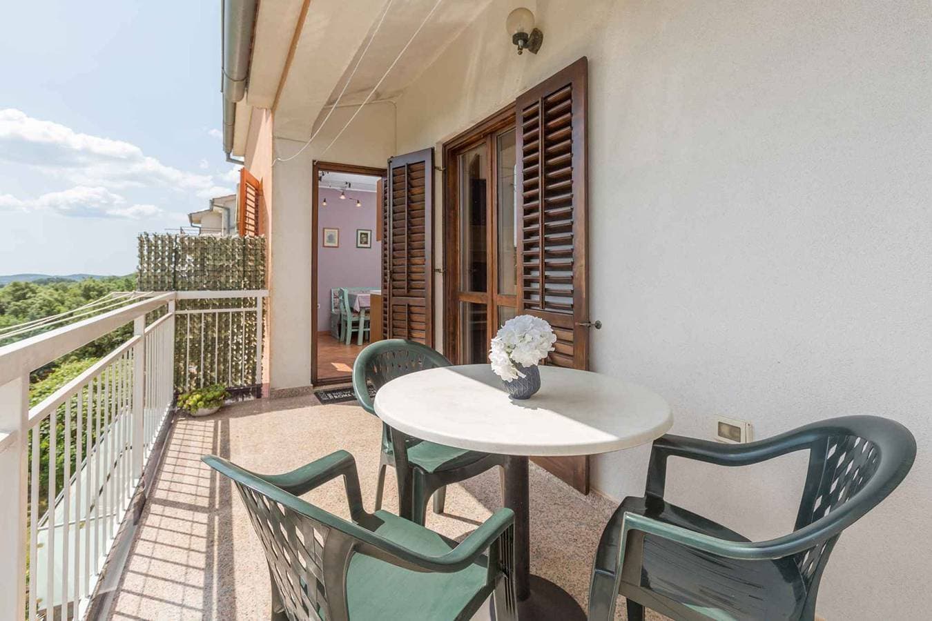 Foto 2 von 24: Ferienwohnung mit Klimaanlage und Balkon