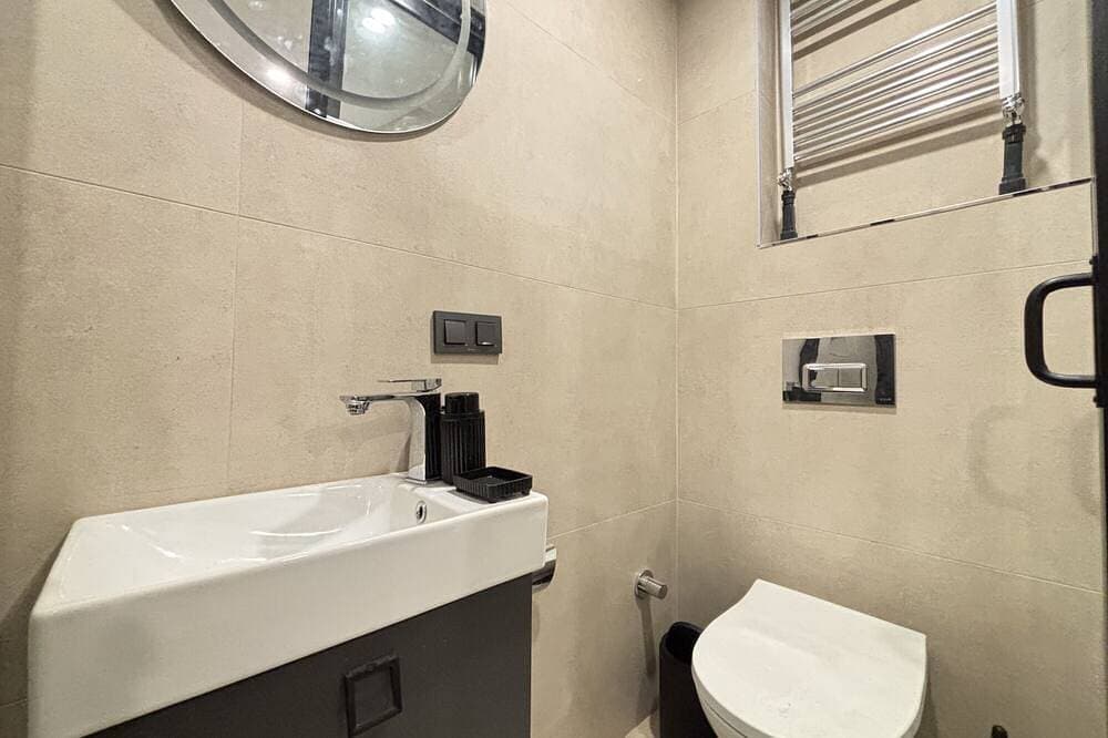 Foto 6 von 21: Central Şişli Gem – Modern 1Br with AC