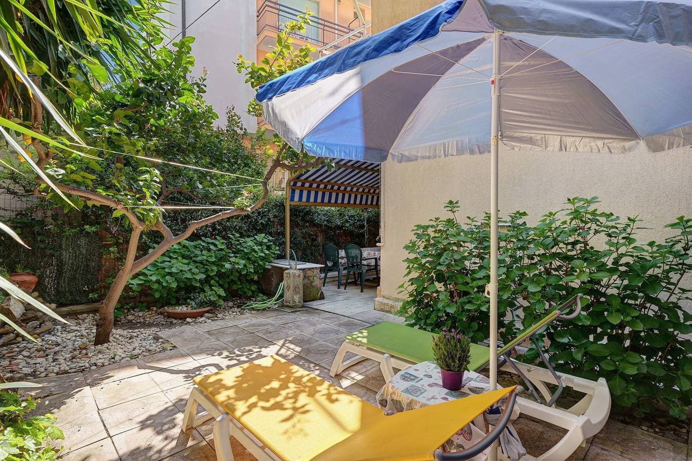 Foto 2 von 22: Apartment 'Casa Dei Garofani – Kostenfreier Parkplatz' mit privatem Garten