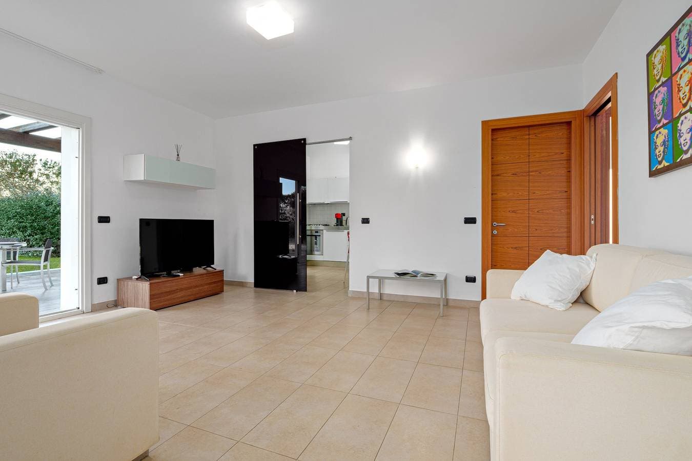 Foto 13 von 27: Geräumige Ferienwohnung "Villa Marconi 6" mit Meerblick, privater Terrasse und Garten