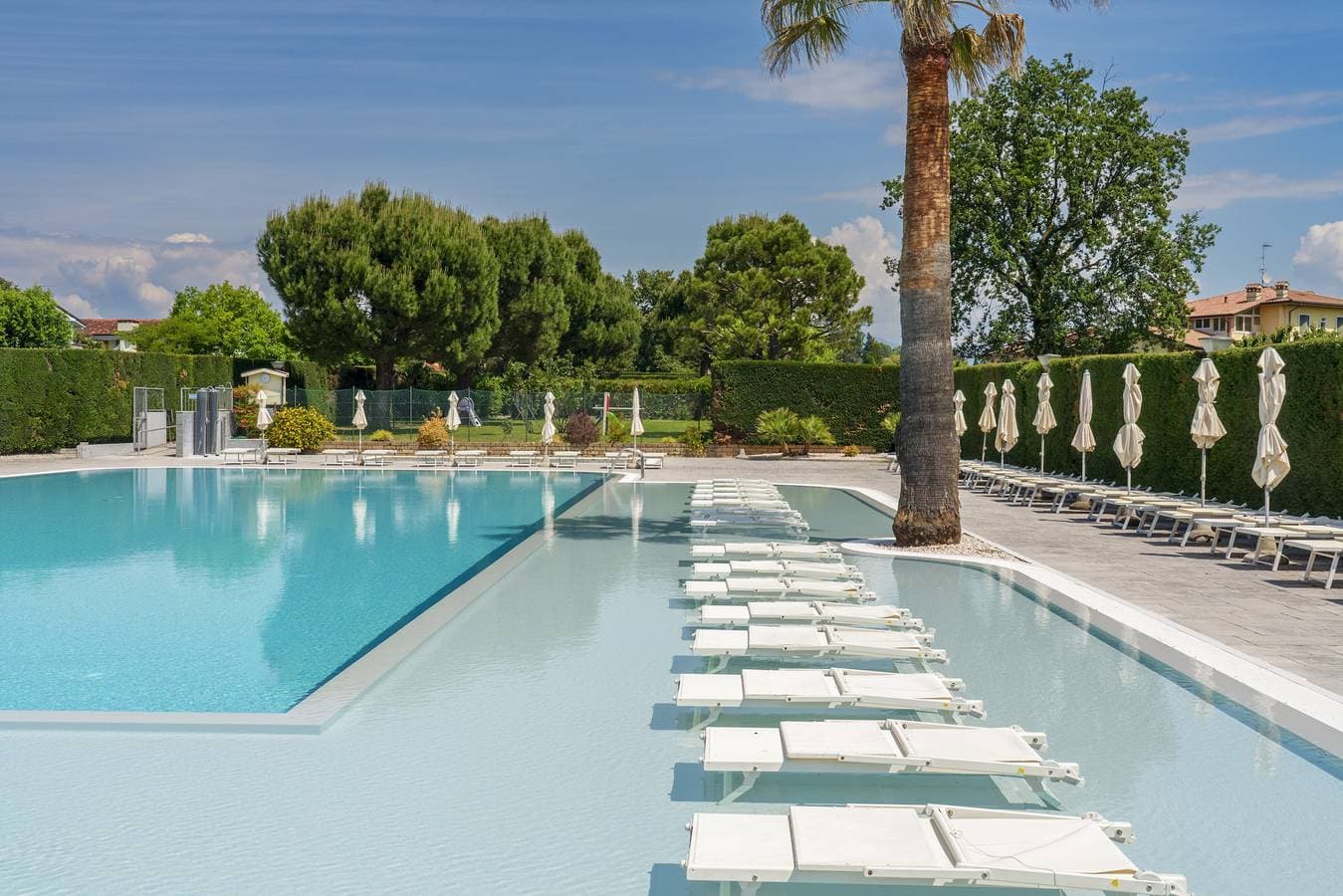 Foto 5 von 40: Regarda -Apple bilocale con piscina e parcheggio coperto