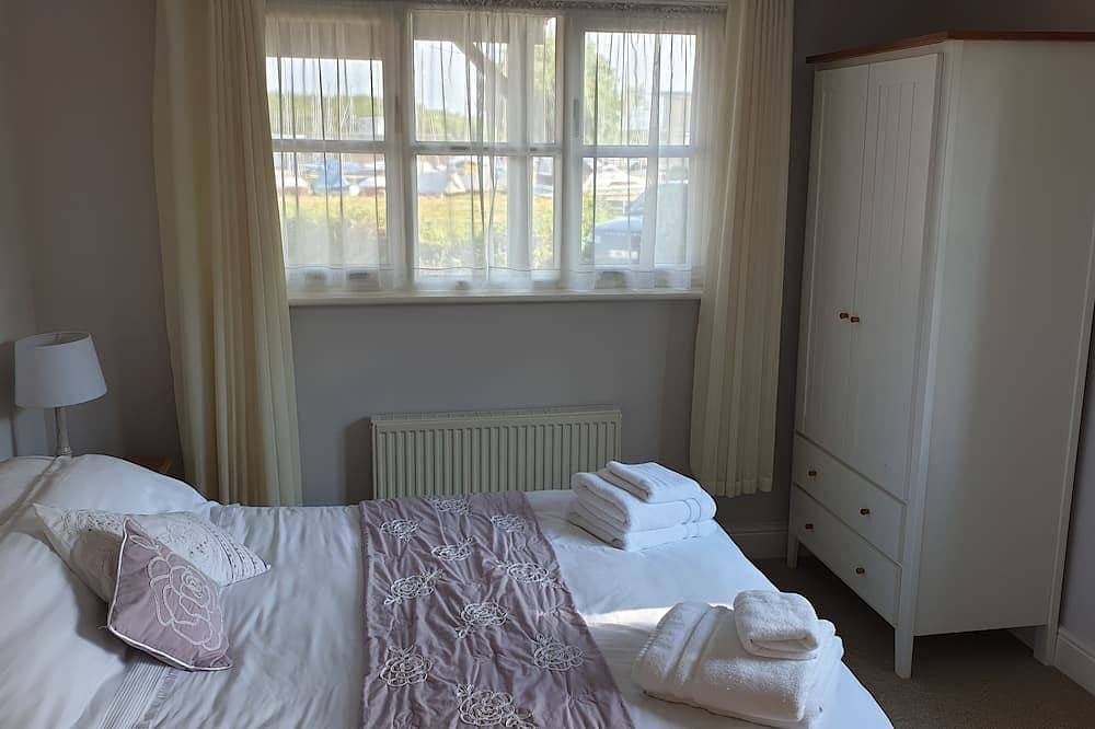 Foto 5 von 30: Waterside House mit Garten (3 Schlafzimmer - 5 Personen)