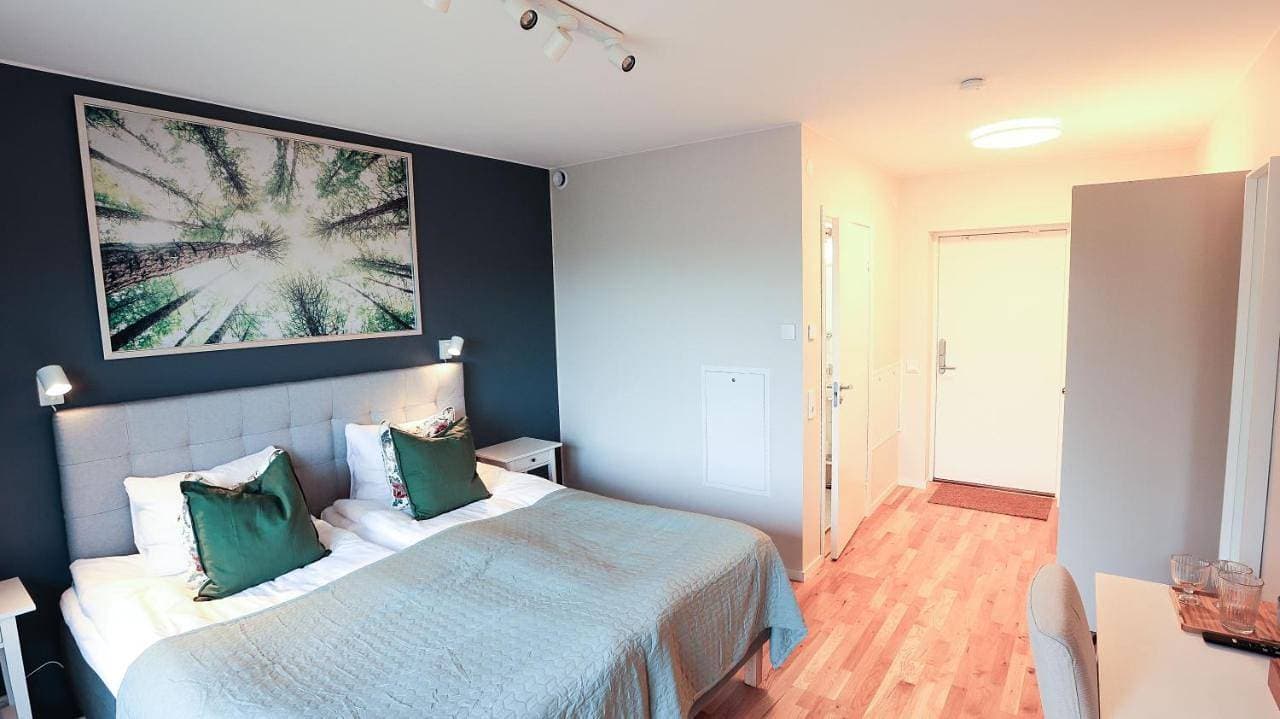 Foto 4 von 11: Double Room with Patio